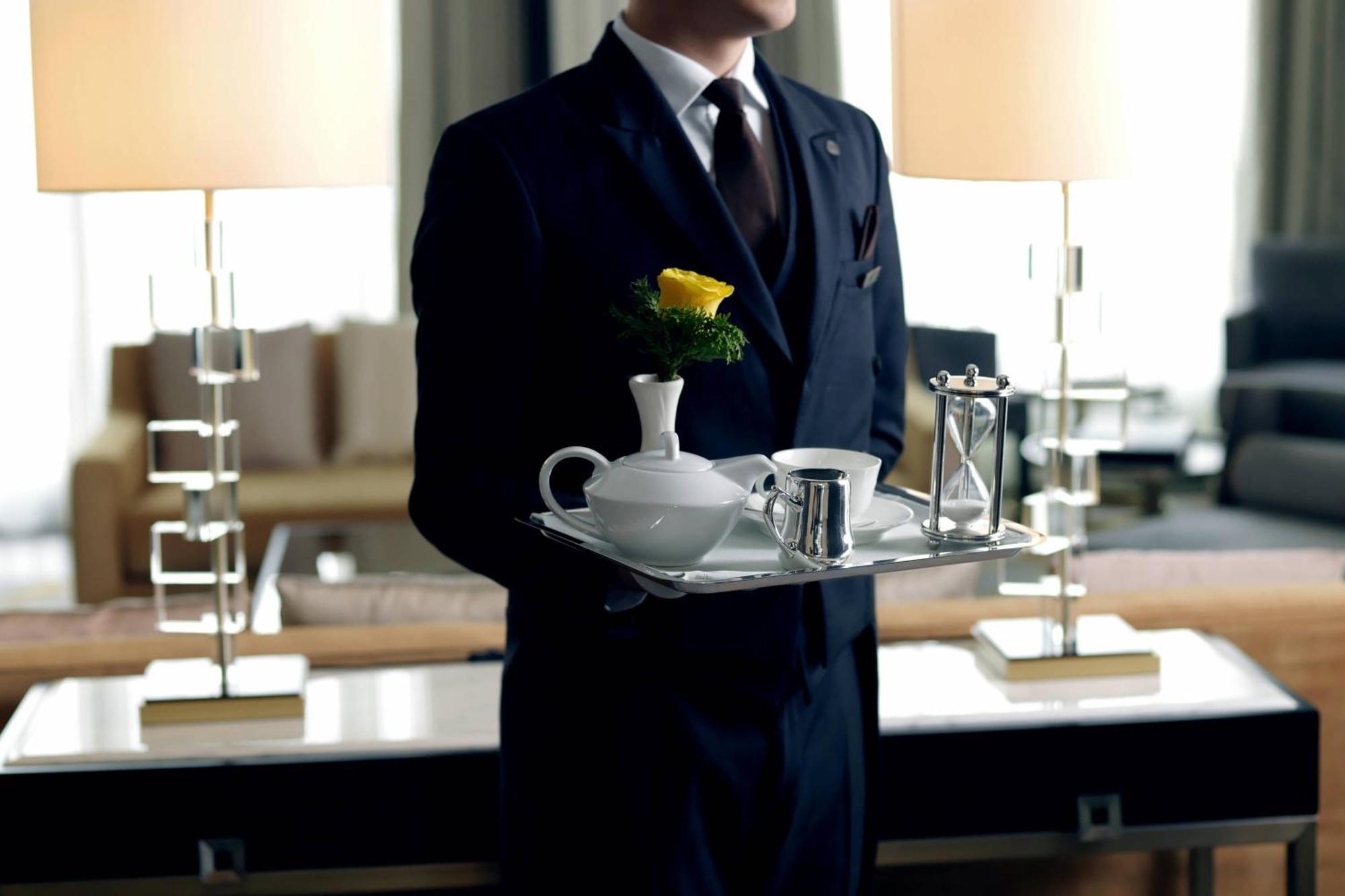 The St. Regis Astana Hotel Bagian luar foto A butler at the Four Seasons Hotel, Seoul