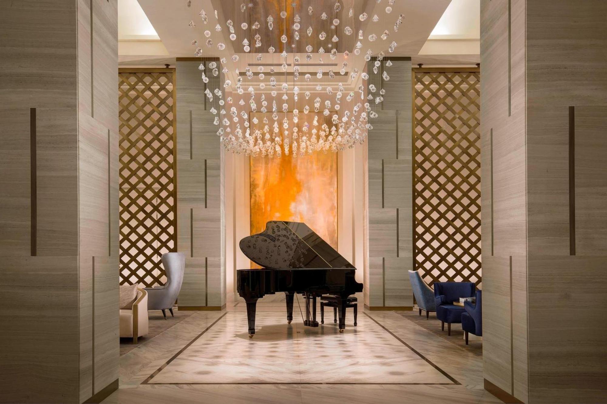 The St. Regis Astana Hotel Bagian luar foto The piano at the lobby