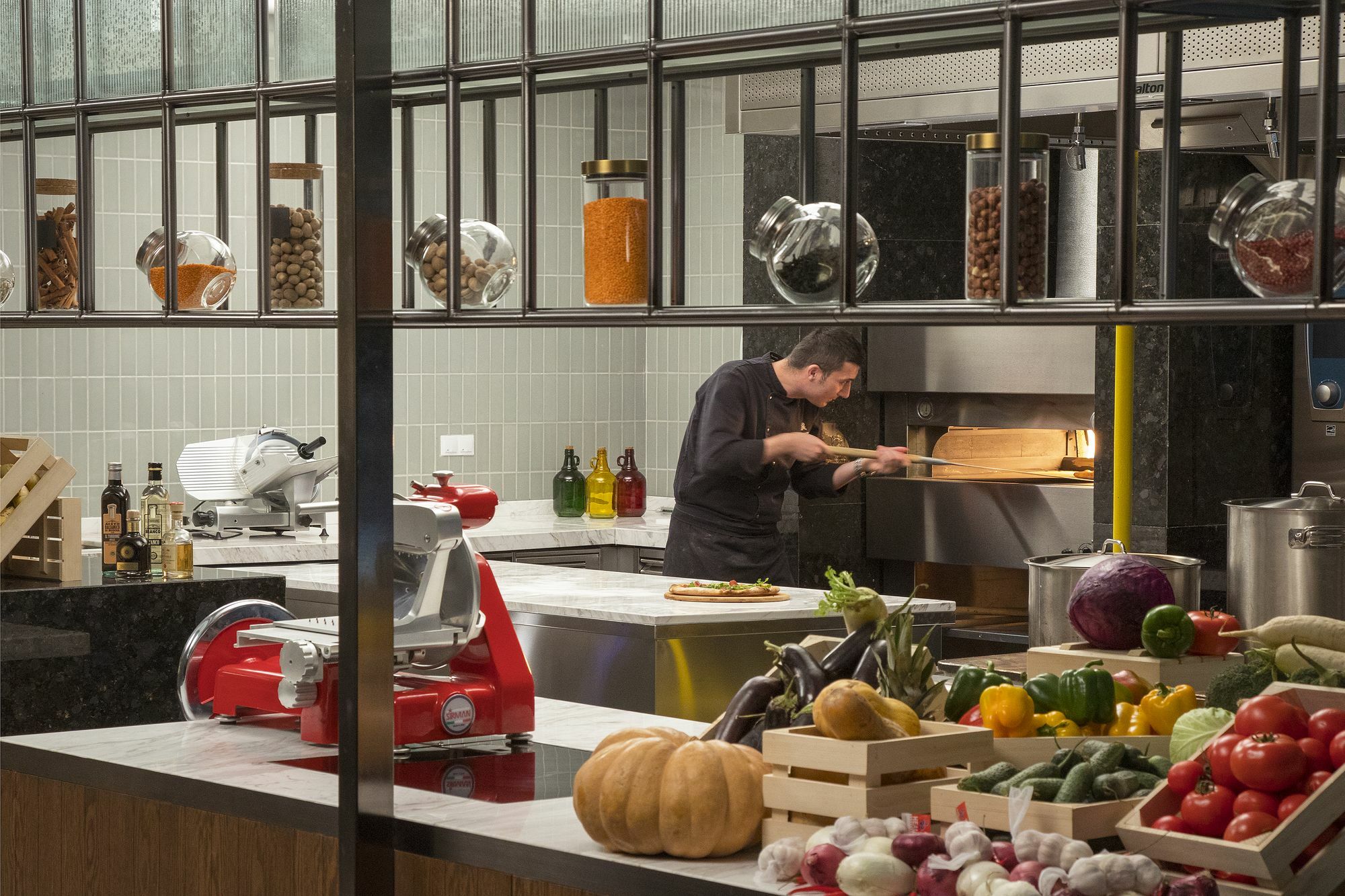 The St. Regis Astana Hotel Bagian luar foto A chef at work